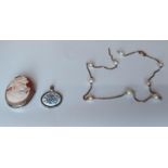 A silver and carved shell cameo brooch along with a silver and enamel pendant and pearl necklace.