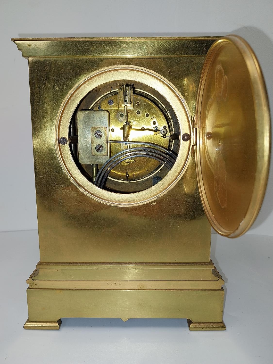 An early 20th century brass mantle clock with relief scrolling foliate and knight design, classical - Image 2 of 5