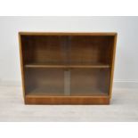 Dwarf bookcase, mid century teak. H.77 W.96 D.28 cm.