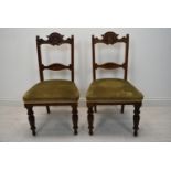 A pair of late 19th century dining chairs