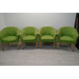 A set of four tub chairs. H.82 cm each.