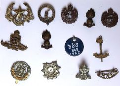 Various cap badges.