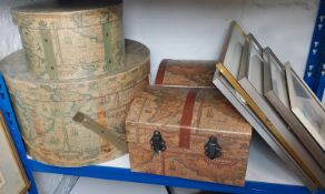 Five pictures and various hat boxes.