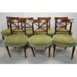 Dining chairs, a set of seven 19th century mahogany, one with a loose leg.