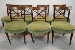 Dining chairs, a set of seven 19th century mahogany, one with a loose leg.
