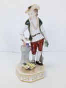 A hand painted Royal Crown Derby porcelain figure of a man in tricorn hat leaning on a column, signe