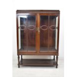 Display cabinet, mid century mahogany. H.130 W.92 D.37 cm.
