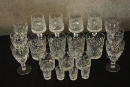 A mixed collection of cut glass crystal. To include shot, wine, sherry and whiskey tumblers. The