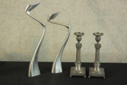 A pair of candle holders designed by Matthew Hilton for SCP. Aluminium. Also, another traditional