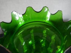 An Edwardian green glass hanging lustre with cut glass prism drops. H.41 W.17 D.17cm