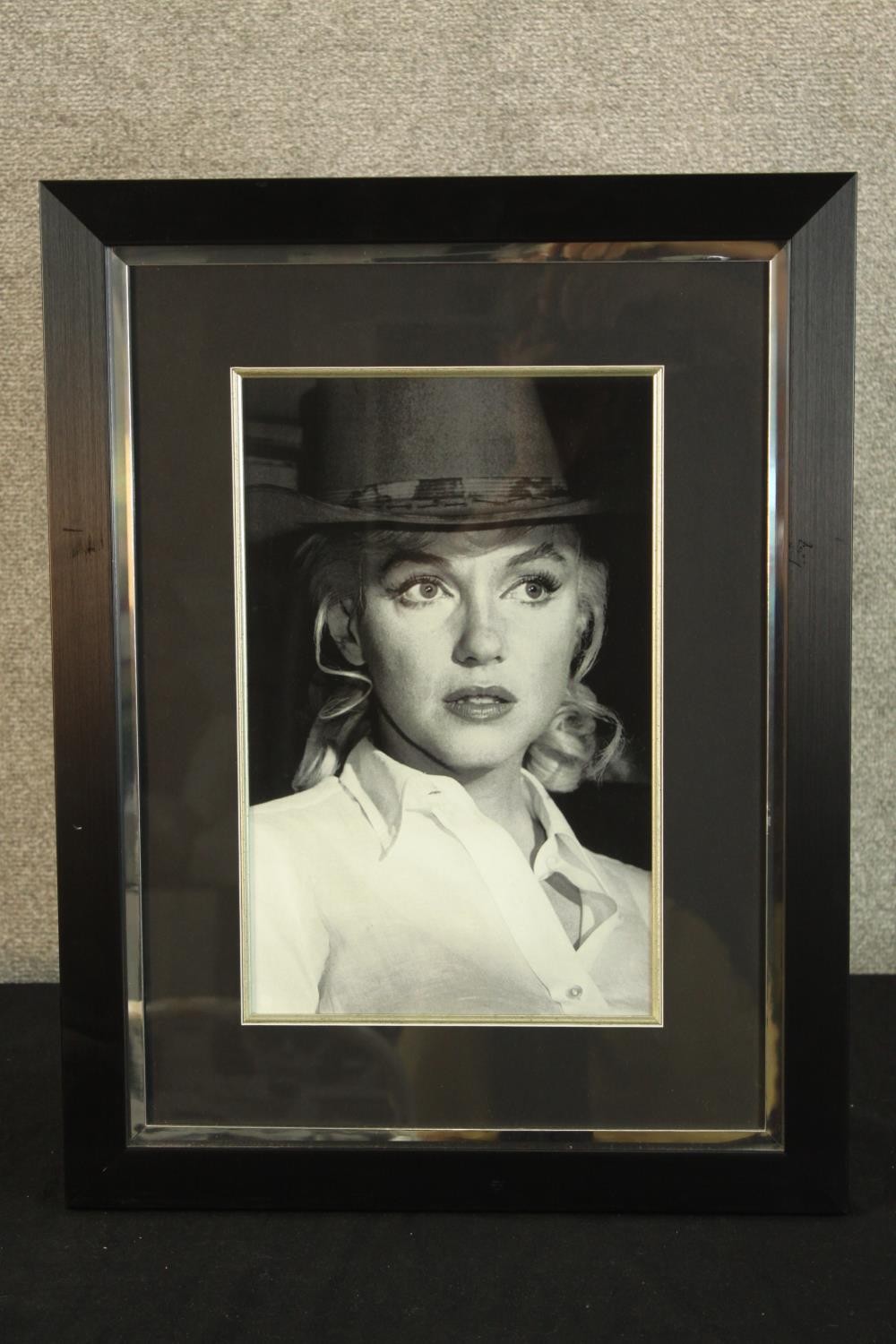 A framed black and white photograph of Marilyn Monroe. H.61 W.47cm. - Image 2 of 4