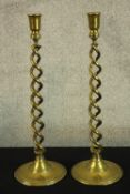 A pair of large 19th century brass candle holders with a barley twist. No makers mark. 49 cm high.