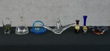 A mixed assortment of decorative glass. A varied collection of style and size. One with a Murino