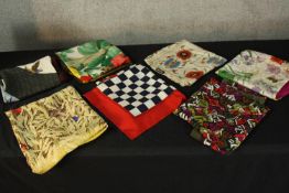 Collection of seven silk scarves. The largest measures 75 x 86 cm.