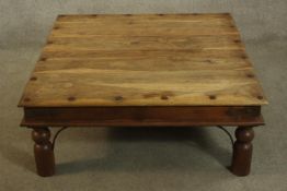 Coffee table, Indian teak and iron. H.40cm W.99cm.