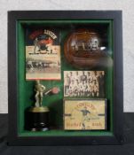 Football memorabilia housed in a box frame. Includes a Man Utd v Arsenal programme and a vintage