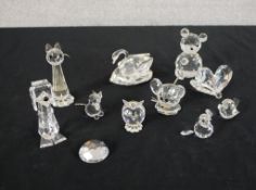 An assortment of Swarovski and other cut glass animals. H.6 W.4 D.4cm largest