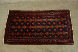A Turkoman rug. L.155 W.65cm.