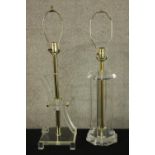 Two Lucite clear perspex lamps. Mid twentieth century. H.77cm (largest).