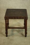 Stool, C.1900 French oak and embossed leather. H.45 W.43cm.