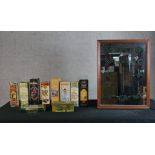 Assortment of drinking related tins together with a contemporary pine framed wine advertising