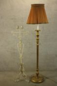 a wrought iron floor lamp set with two iron candle holder along with a vintage carved gilt lamp