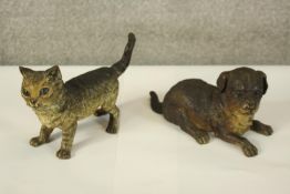 A cold painted metal cat inkwell, with a hinged head that lifts to reveal the well. Also a similar