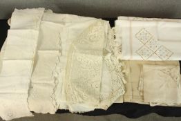 A collection of lace tablecloths. L.220 x W.200cm. (largest).