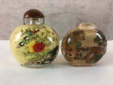 Two 20th century reverse painted glass Japanese snuff bottles, one with mandarin duck and lotus