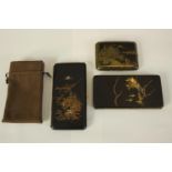 Three 19th century Japanese damascene cigarette cases with various designs, one with a gilded
