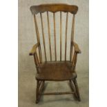 Rocking chair, 19th century Windsor style beech and elm.