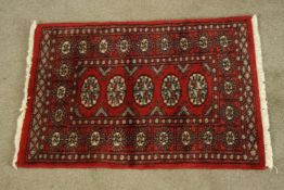 A Belouch rug. L.90 W.64cm.