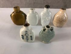 A collection of six early 20th century Chinese snuff bottles, one with a celadon glaze with a