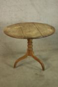 Occasional table 19th century, oak with a pine base. H.72 W.90cm.