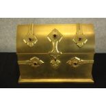 A 19th century Parkins & Gotto gilt metal lockable letter box in the form of a ecclesiastical casket