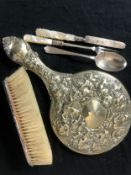 Silver hand mirror, brush and silver cutlery. White metal. The brush and mirror are probably
