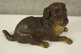 A collection of early 20th century cold painted bronze and brass dogs and cats, including a