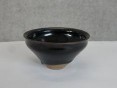 A Jian bowl or Chinese oil spot bowl. No makers mark. H.7 x W.12 x D.12 cm.
