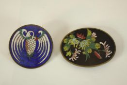 Two 19th century Japanese cloisonné pieces, a bronze and enamel robe button decorated with a white