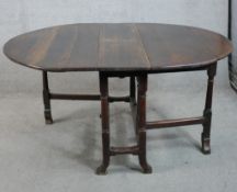 Oak dropleaf gateleg table, 19th century. H.72 W.139 D.104cm