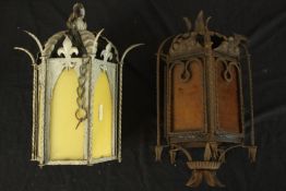 Two ornate Gothic style spiked hanging lanterns. One painted. H.40cm.