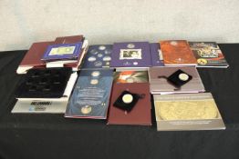 Assortment of late 20th century British coin proof sets, complete with packaging and some