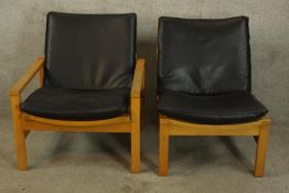 Lounge chairs, mid century beech framed in faux leather with maker's label.