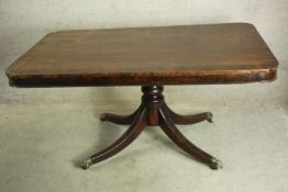 A 19th century mahogany square topped table with rounded corners. H.71 W.152 D.95cm.