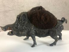 A late 19th century cold painted bronze novelty pen wipe in the form of a wild boar. H.14 W.24cm.