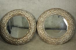 A pair of gilt framed wall mirrors. Dia.72cm. (each)