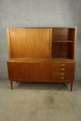 Sideboard cabinet, mid century teak with a tambour fitted upper section. (In two parts). H.147 W.