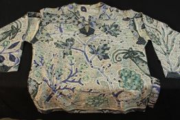 A Hermes silk tunic and belt, featuring a mosaic print with animals in shades of blue, green and
