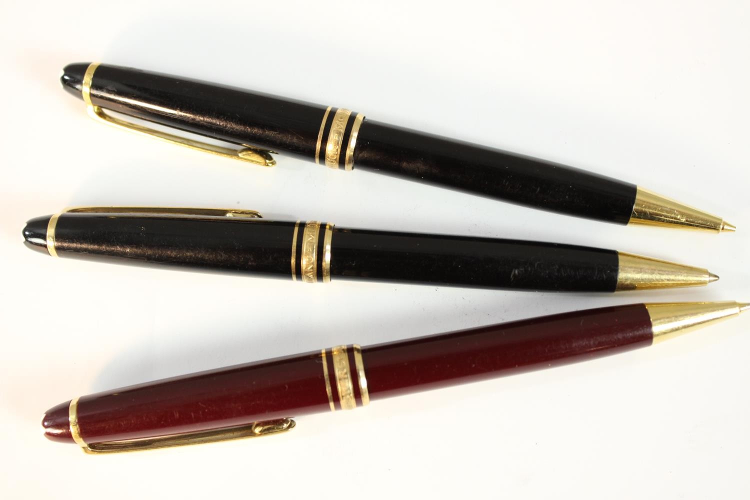 Three Mont Blanc Meisterstuck black lacquer ballpoint pens with gold plated detailing along with a - Image 2 of 7