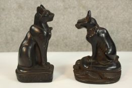 Two black Egyptian cats. Probably made from resin. Each measure H.16 cm.